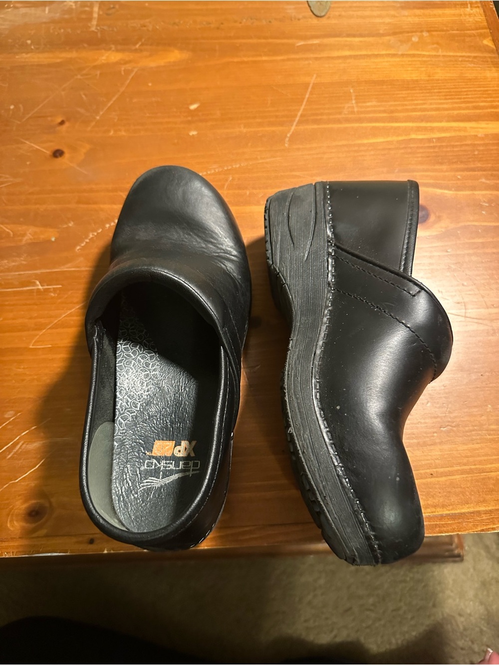 Dansko Black Leather Slip-On Clogs